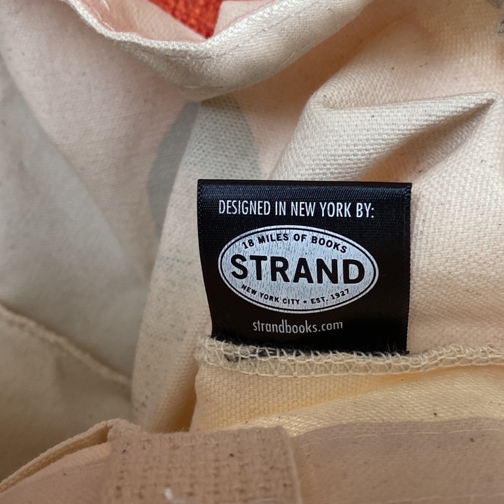 The Strand Icon RBG Time is one the side of CHANGE Tote Bag - Picture 6 of 10